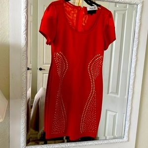 Bright orange dress by Jesse M size large but fits very tight